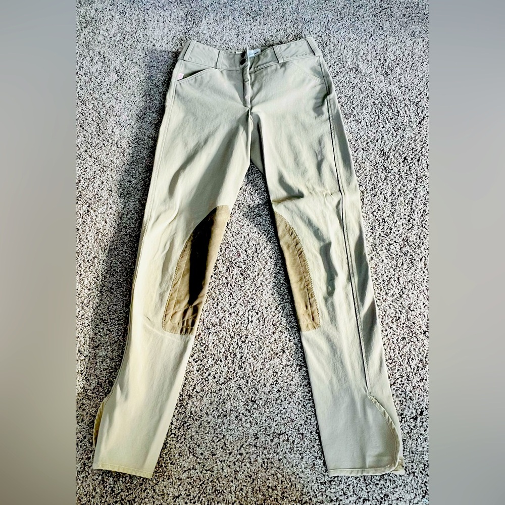Tailored Sportsman tan knee patch breeches.